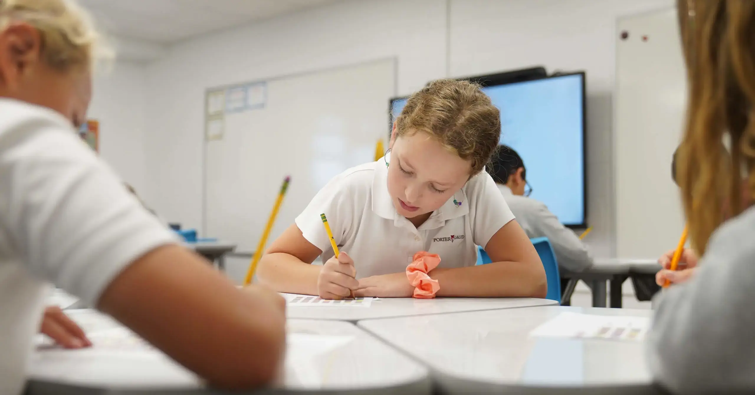 Porter Gaud pupil working in class